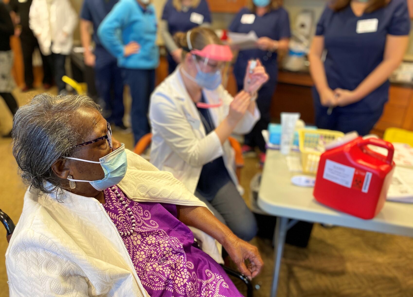 Blanche Palmer, 91, receives the Moderna coronavirus vaccine in Greenville, S.C.
